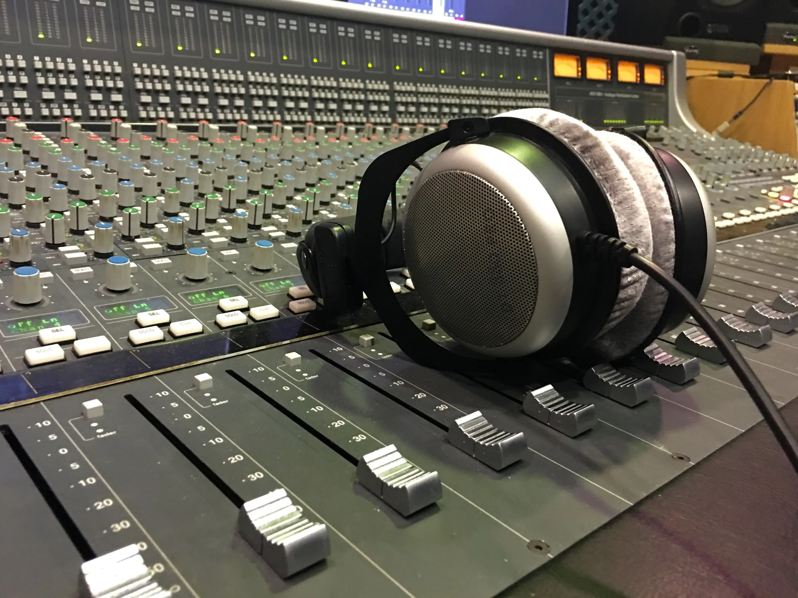 Headphones on a mixing console